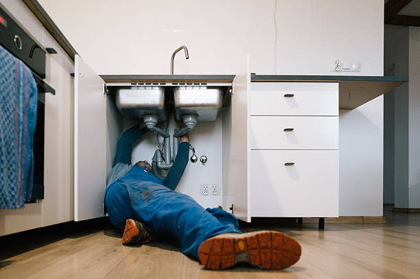 Professional Emergency Plumber technician working in Woodsfield, OH